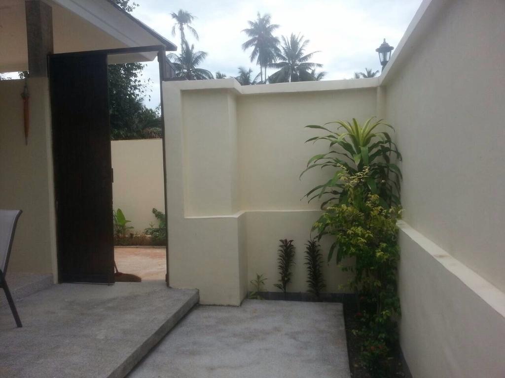 Khanom Garden Suite Quarto foto